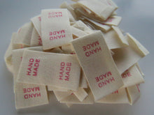 Load image into Gallery viewer, 50 Smaller Cotton Flag Hand Made Labels- choose font colour- Pink, Blue or Black 15mm