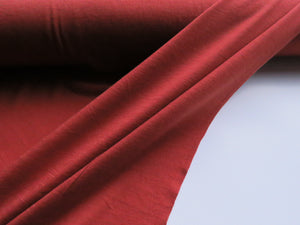 1m Charleston Rust 85% merino 15% corespun nylon jersey knit 120g