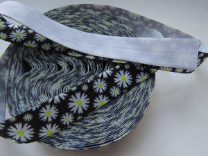 4.6m White Daisy on black 15mm wide fold over elastic