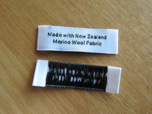 Load image into Gallery viewer, 10 White &quot;Made with New Zealand Merino Wool Fabric&quot; Woven labels 50mm x 10mm