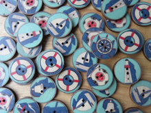 Load image into Gallery viewer, 10 Mixed Nautical Prints- anchor, lifebuoy, yacht etc 25mm buttons