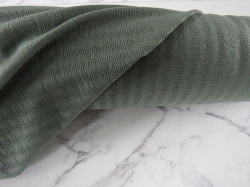 1.5m Huntsmen Olive green textured jersey knit 60% merino 40% polyester 170g