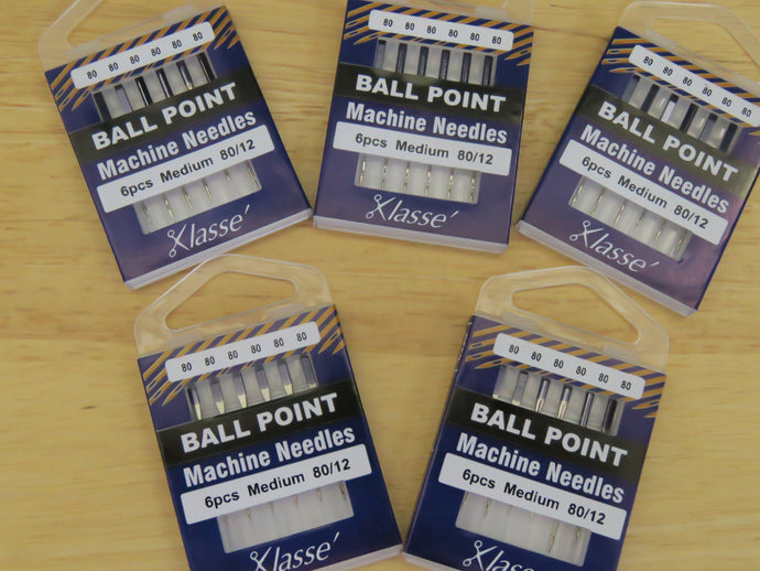 Make sure you buy ballpoint or jersey knit sewing machine needles when ordering merino fabric.