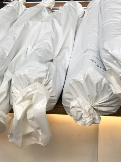 What's in these bags? Who wants to see what new merino fabrics will be available?