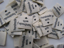 Load image into Gallery viewer, 100 Cream handmade with heart symbol (love) 20x 2cm flag labels