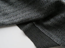 Load image into Gallery viewer, Offcut 16cm L x 128cm W Black Dash and Line print on Charcoal grey 250g 100% merino- precut length
