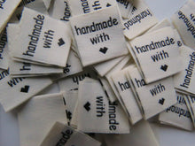 Load image into Gallery viewer, 100 Cream handmade with heart symbol (love) 20x 2cm flag labels
