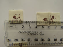 Load image into Gallery viewer, 25 Handmade with heart and Sheep Cotton Flag Labels 2 x 2cm folded