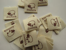 Load image into Gallery viewer, 25 Handmade with heart and Sheep Cotton Flag Labels 2 x 2cm folded