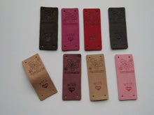 Load image into Gallery viewer, 10 Mixed Colour PU Leather  Butterfly Handmade Foldable Labels and With (heart symbol) Love on other side. 50x 20mm