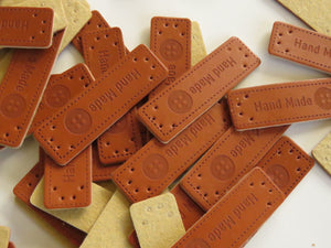 10 Hand Made with Button print PU leather labels.