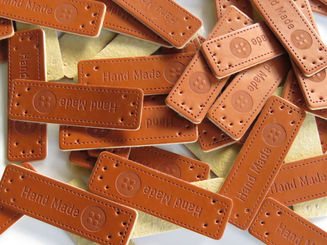 10 Hand Made with Button print PU leather labels.