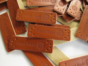 10 Hand Made with Button print PU leather labels.