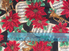 Load image into Gallery viewer, 55cm L x 90cm wide Trumpet Music and Red Poinsetta print  Christmas fabric 100% cotton