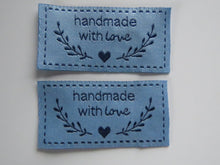 Load image into Gallery viewer, 25 Blue Handmade with Love labels with heart and branch 50mm wide x 25mm high