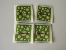 Load image into Gallery viewer, 50 Green Handmade with white folower print Woven Hand Made labels 34mm wide x 34mm high approx.