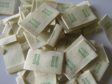 Load image into Gallery viewer, 25 Green Font Hand Made Smaller Cotton Flag Hand Made Labels-15mm x 15mm
