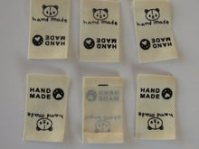 Load image into Gallery viewer, 10 Cotton Labels with Bear Print Handmade and/or Bear Paw Handmade labels 25mm wide x 20mm when folded