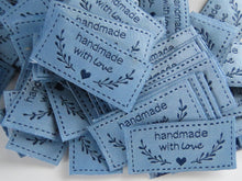 Load image into Gallery viewer, 25 Blue Handmade with Love labels with heart and branch 50mm wide x 25mm high