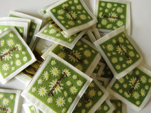 Load image into Gallery viewer, 50 Green Handmade with white folower print Woven Hand Made labels 34mm wide x 34mm high approx.