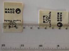 Load image into Gallery viewer, 10 Cotton Labels with Bear Print Handmade and/or Bear Paw Handmade labels 25mm wide x 20mm when folded