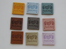 Load image into Gallery viewer, 25 Mixed Colour Heart with wool wrapped around Hand made PU leather labels. 25 x 25mm