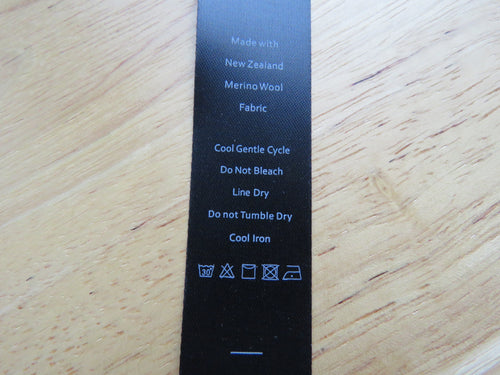 10 Black Satin washing instructions/ Made with New Zealand Merino wool labels