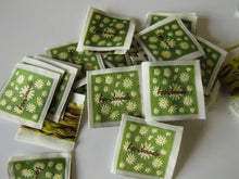 Load image into Gallery viewer, 50 Green Handmade with white folower print Woven Hand Made labels 34mm wide x 34mm high approx.
