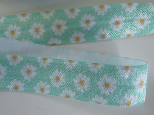 4.6m White Daisy with orange centre pale green background Fold Over Elastic FOE Foldover 15mm