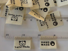 Load image into Gallery viewer, 10 Cotton Labels with Bear Print Handmade and/or Bear Paw Handmade labels 25mm wide x 20mm when folded