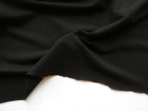1.5m Stratton Black 43% Merino 44% Tencil 6% elastane 7% Nylon Sweatshirting 280g 190cm wide