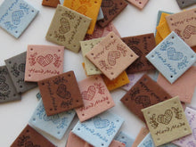 Load image into Gallery viewer, 25 Mixed Colour Heart with wool wrapped around Hand made PU leather labels. 25 x 25mm