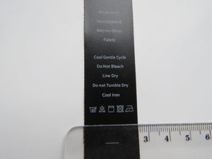 10 Black Satin washing instructions and 10 White Made with New Zealand Merino wool labels