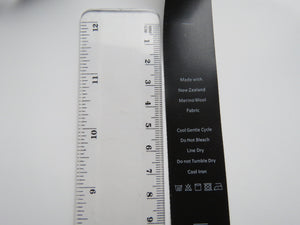 10 Black Satin washing instructions and 10 White Made with New Zealand Merino wool labels