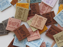Load image into Gallery viewer, 25 Mixed Colour Heart with wool wrapped around Hand made PU leather labels. 25 x 25mm