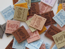 Load image into Gallery viewer, 25 Mixed Colour Heart with wool wrapped around Hand made PU leather labels. 25 x 25mm