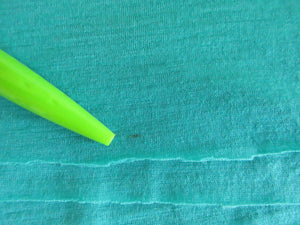 60cm Seafoam Green 87% merino 13% nylon corespun merino 150g 155cm- has a few tiny brown dots