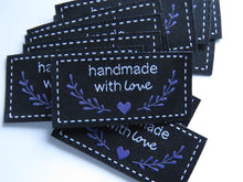 Load image into Gallery viewer, 10 Black Handmade with Love in white font labels with heart and branches in purple 50mm wide x 25mm high