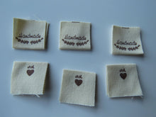 Load image into Gallery viewer, 10 Handmade underlined with Heart twigs Cotton Flag Labels 2 x 2cm folded