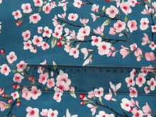 Load image into Gallery viewer, 1m Cherry blossom print on teal background 95% EcoVero viscose with stretch 150cm wide.
