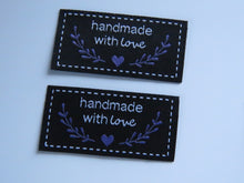 Load image into Gallery viewer, 10 Black Handmade with Love in white font labels with heart and branches in purple 50mm wide x 25mm high