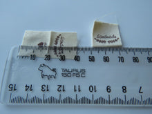 Load image into Gallery viewer, 10 Handmade underlined with Heart twigs Cotton Flag Labels 2 x 2cm folded