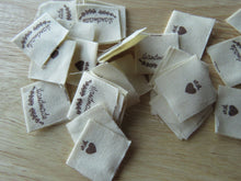 Load image into Gallery viewer, 10 Handmade underlined with Heart twigs Cotton Flag Labels 2 x 2cm folded
