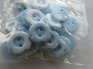10 Pale Blue with raised white flower around edge 12.5mm buttons
