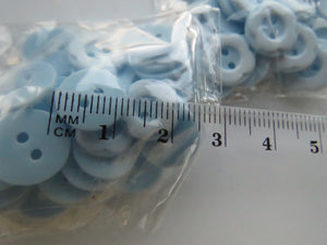 10 Pale Blue with raised white flower around edge 12.5mm buttons