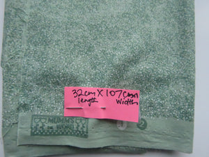 32cm long x 107cm wide green ditsy floral Mumm's the Word print 100% cotton