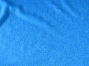 Sale 30% off-1.55m Whirlwind Blue 85% merino 15% corespun nylon 120g jersey knit -lightweight- reduced as small holes along selvage edge but fabric is fine