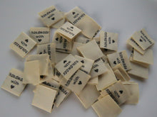 Load image into Gallery viewer, 100 Cream Beige Handmade with (love) heart symbol woven flag labels 2 x 2cm