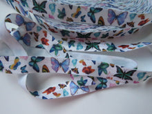 Load image into Gallery viewer, 5m Butterfly print on white Fold over Elastic FOE Fold over elastic 15mm wide