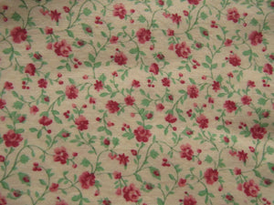 1.65m mini rose print on cream background 100% cotton 112cm wide.
